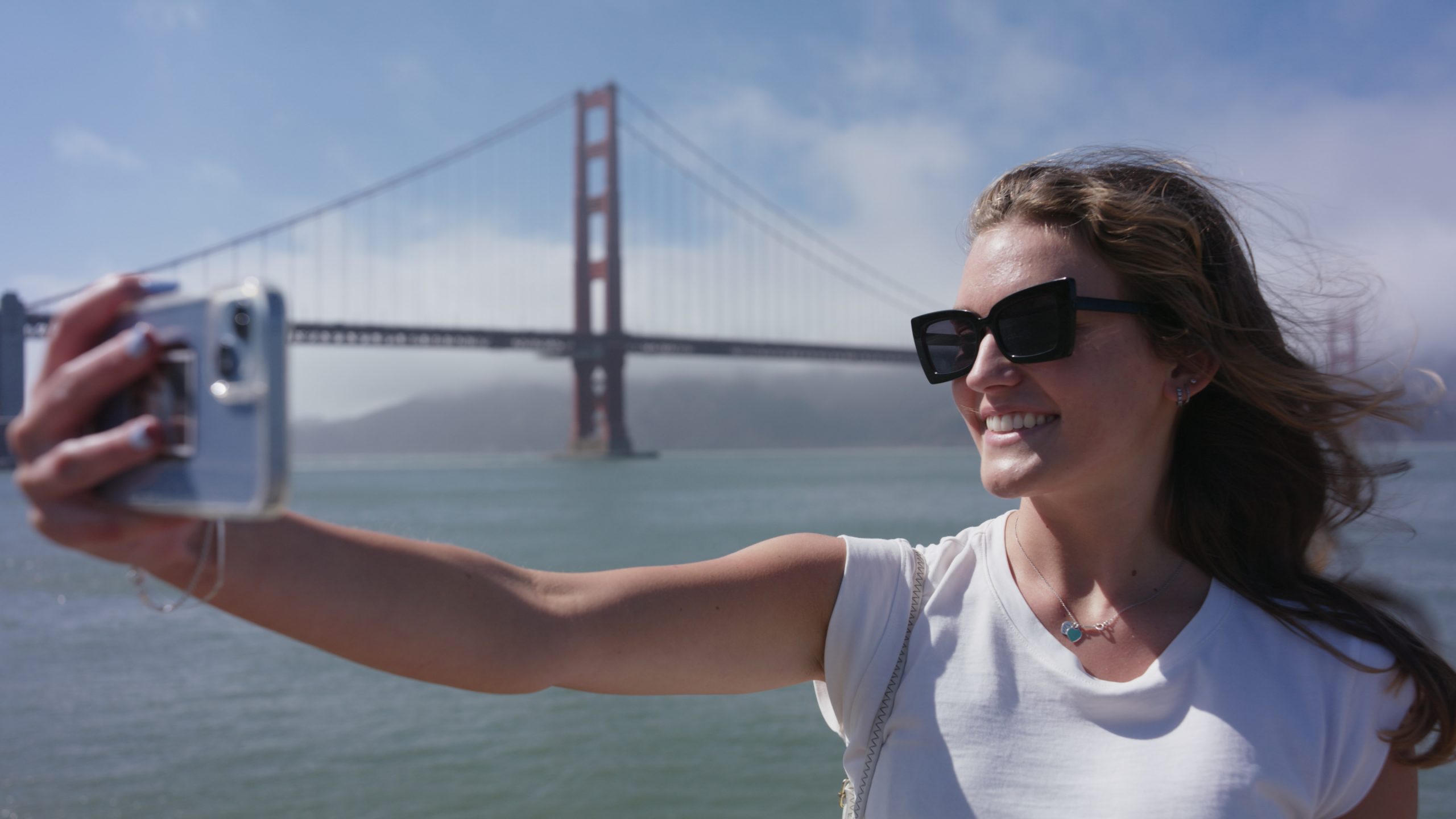 Flo selfie Golden Gate Bridge mid scaled